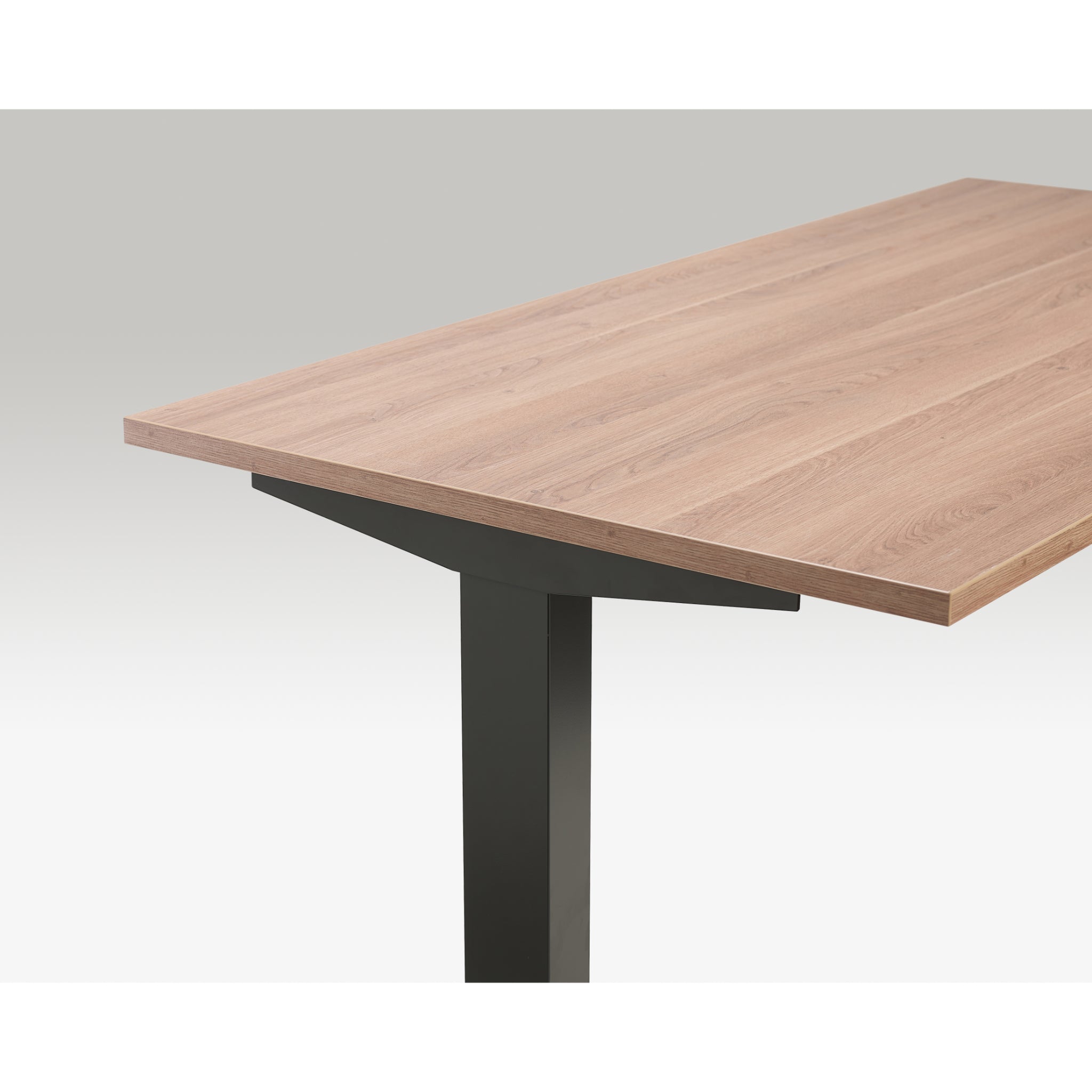 Close-up of Quiet Motor Standing Desk with wooden desktop and anthracite metal leg