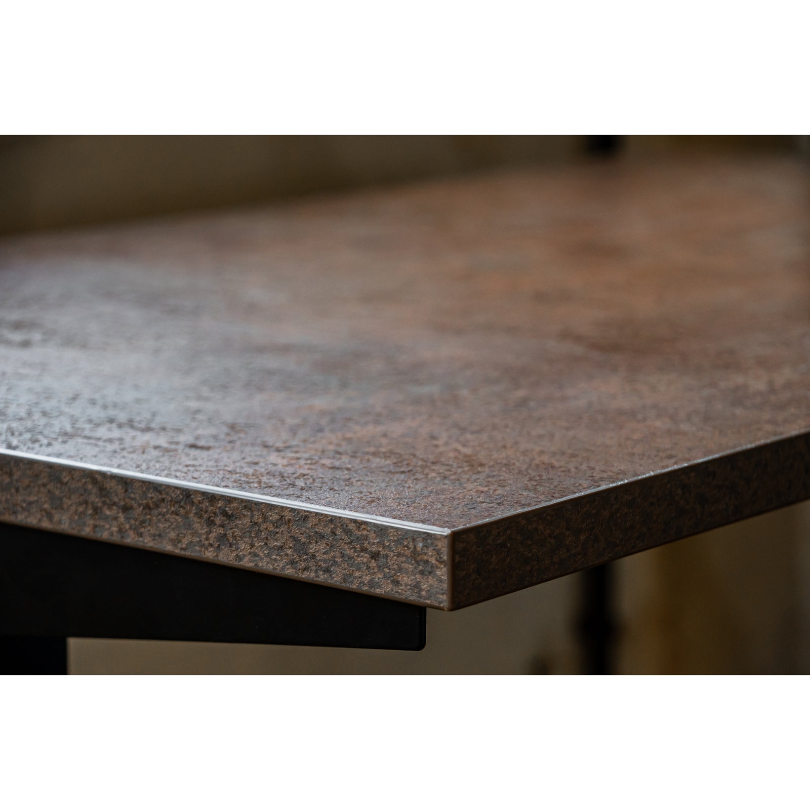 Close-up of a sustainably sourced desktop with a textured, natural wood finish