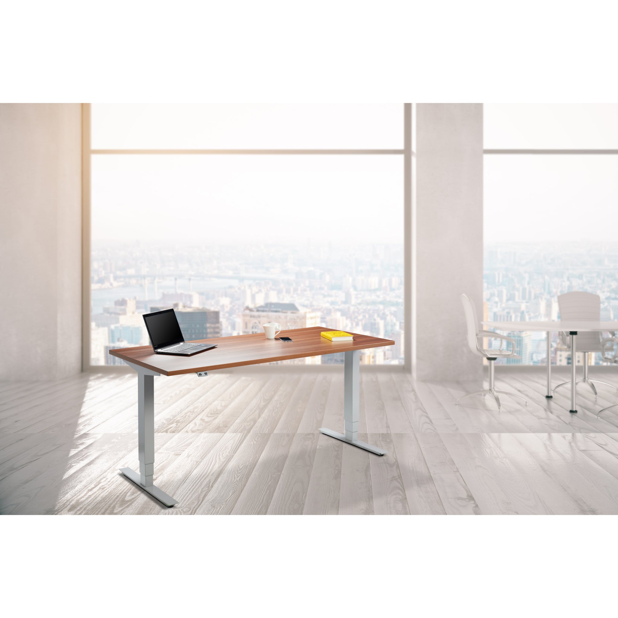 UrbanErgo Signature standing desk in a bright modern workspace overlooking a city skyline